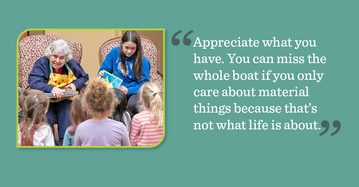 Senior living resident Bess and her great-granddaughter read to preschoolers.